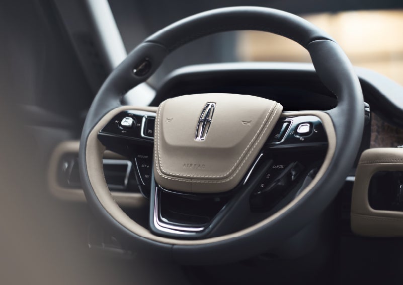 The intuitively placed controls of the steering wheel on a 2024 Lincoln Aviator® SUV | Koons Lincoln of Bethesda in Silver Spring MD