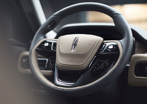 The intuitively placed controls of the steering wheel on a 2024 Lincoln Aviator® SUV | Koons Lincoln of Bethesda in Silver Spring MD