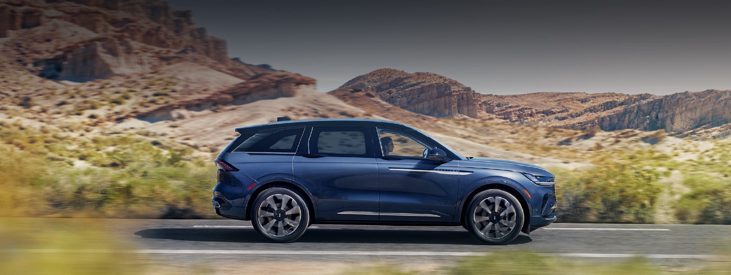 A 2024 Lincoln Nautilus® SUV is being driven in a desert setting. | Koons Lincoln of Bethesda in Silver Spring MD