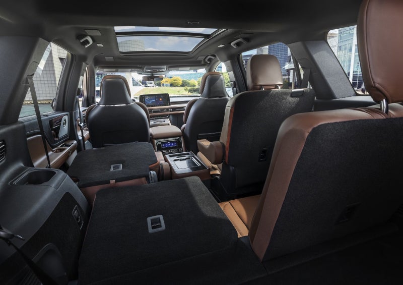 One side of the PowerFold® third-row seat and a second-row seat are folded forward in the 2026 Lincoln Aviator® SUV. | Koons Lincoln of Bethesda in Silver Spring MD